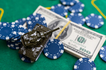 Poker chips, dollars and a pair of aces