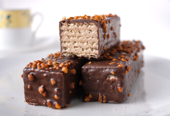glazed waffle bars with nuts on a white background, copy space