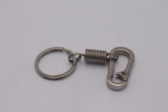 a key ring made of iron. circle and clamp on a white background