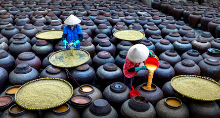 Traditional soy sauce factory, where soya beans are fermented to produce the soy sauce which is...