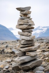 Fototapeta na wymiar minimalist Inukshuk made of piled stones created using generative AI tools