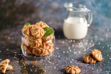 Homemade coconut cookies on a gray background. Healthy food concept.