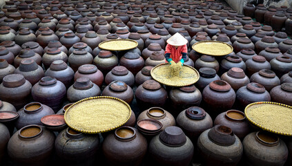 Traditional soy sauce factory, where soya beans are fermented to produce the soy sauce which is used in Vietnam cooking at a soy sauce factory in Hung Yen,VN