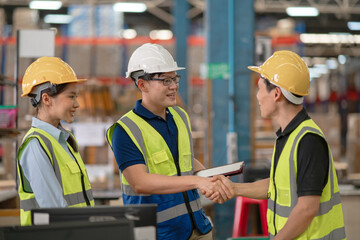 Managers and employees are counting stocks in a warehouse.