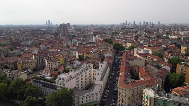 Europe, Italy, Milan Drone aeriel view of  skyline with modern skyscrapers from Milano Cortina 2026 Olympic Village - city landscape from Corso Lodi Porta Romana 