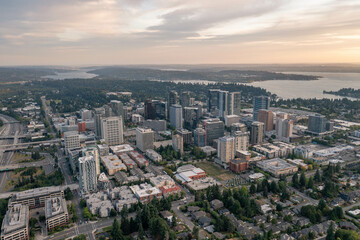 Fototapeta na wymiar The City of Bellevue in Washington State Sunset With Dowtown Highrise in View from Above Drone Aerial Shot