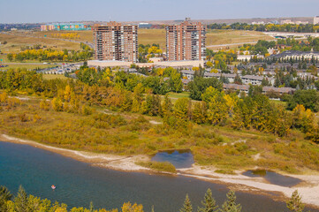 Wonderful autumn landscape in front of a river in the region of Calgary, Alberta, Canada. Canadian landscape showing vegetation and a river during autumn in Canada.