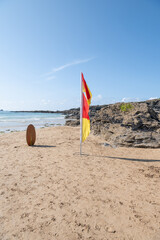 safe to swim flag on Cornish beach