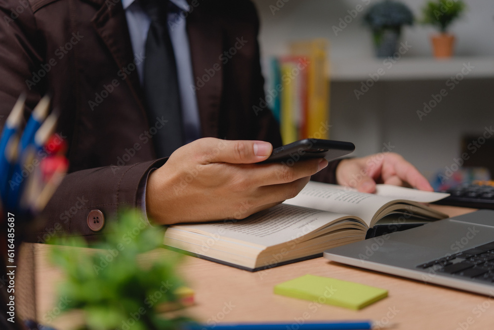 Aufkleber man using smartphone digital devices reading a book workstation digital technology and reading habit