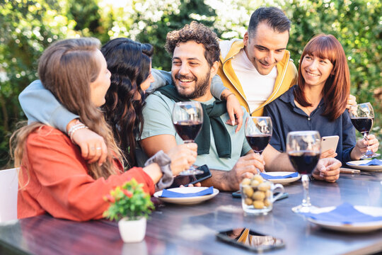 Multiracial Friends Enjoying BBQ party Outdoor.