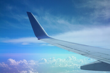 Obraz premium View of the sky and clouds from the airplane window. 