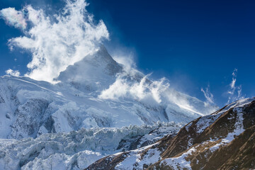 Fototapeta na wymiar Himalaya scenic mountain landscape against the blue sky. Manaslu mountain 