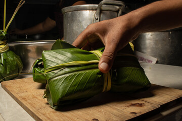 THE JUANE, TYPICAL FOOD OF THE PERUVIAN AMAZON, IS CONSUMED IN THE TRADITIONAL CELEBRATION OF SAN...