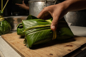 THE JUANE, TYPICAL FOOD OF THE PERUVIAN AMAZON, IS CONSUMED IN THE TRADITIONAL CELEBRATION OF SAN...