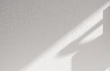 Shadow diagonal on grey cement wall texture. Sunlight overlay white plaster paint on concrete floor,Abstract Light effect for Monochrome photo, mock up, poster, wall art, design presentation