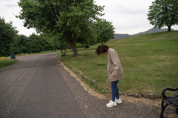 Woman looking to the ground