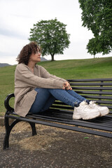 Woman sitting on a bench