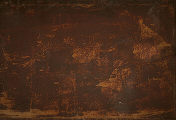 Brown beige abstract textured background with red hues. A weathered, rust-eaten textured sheet of...