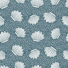 Sea shells with bubbles seamless vector on blue background