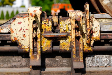 Yellow painted part of a railway wagon