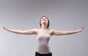 Happy attractive young woman rejoicing