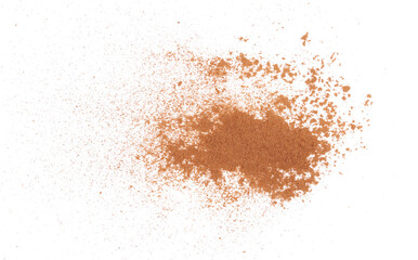 Pile cinnamon powder isolated on white, with top view