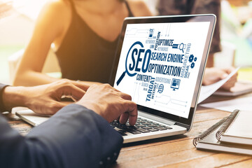 SEO search engine optimization for modish e-commerce and online retail business showing on computer...