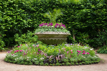 Naklejka premium Colourful pink and purple summer flowers in the St John's Lodge garden, located in the Inner Circle, Regent's Park, London UK