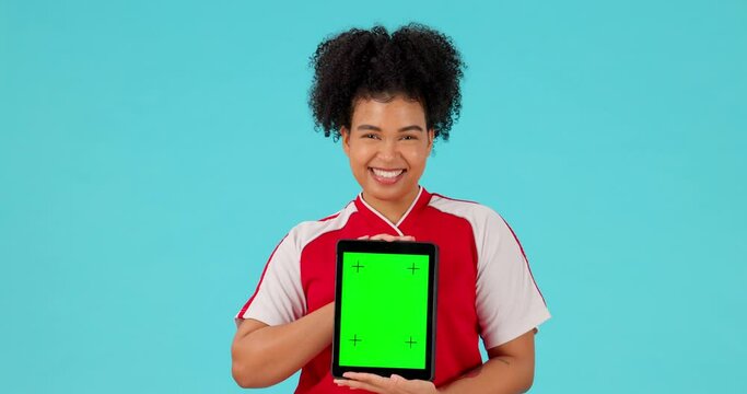 Soccer, woman face and digital tablet with green screen in stdio for sports, news or results on blue background. Mockup, space and female portrait with tracking markers for football, fitness or promo