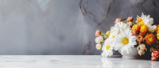 Beautiful white flowers, chrysanthemums, over marble background. Bouquet of flowers at cemetery , funeral concept.