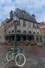 Fotobehang Hoorn, The Netherlands - Square "De Roode Steen" (Roode Steen square) with the Weigh House (De Waag) which was built in 1609. © Karl Allen Lugmayer