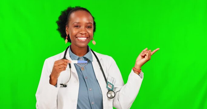 Pointing, healthcare and black woman with a pregnancy test on a green screen for a choice. Decision, portrait and African doctor with pregnant results and gesture isolated on mockup studio background