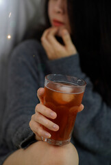 
Woman holding glass, drunk because of beer, alcoholic drink taste concept.