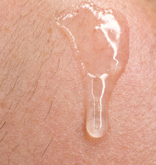 clear serum dripping down skin 