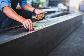 UT, Ultrasonic testing to detect imperfection or defect in welding of steel structure outside. NDT Inspection.
