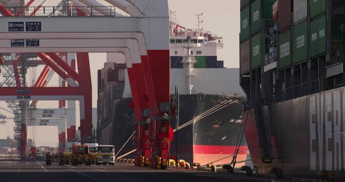 Containers and cranes near the port in Aomi Tokyo telephoto shot