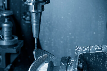 The 5 axis machining center cutting the boat propeller parts  parts with taper ball end mill tool.