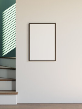 minimalist frame mockup poster on the white wall beside the stairs