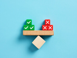 Right and wrong balance. Positive or negative decision making or choice of approval or rejection.