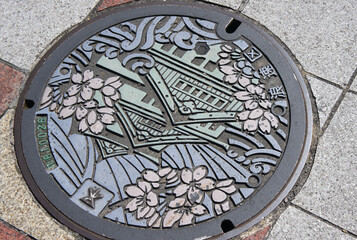 manhole cover in the street