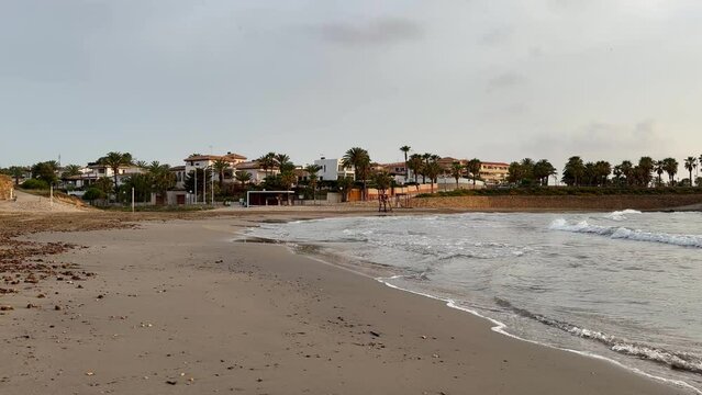 La Cala Estaca in Playa Flamenca, Orihuela Costa, Costa Blanca, Spain. A nice little beach filmed during sunrise in June.
