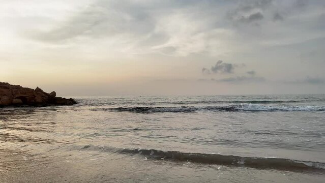 La Cala Estaca in Playa Flamenca, Orihuela Costa, Costa Blanca, Spain. A nice little beach filmed during sunrise in June.