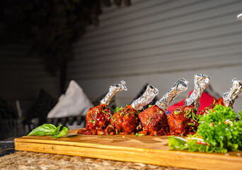 chicken wings stacked on a plate 