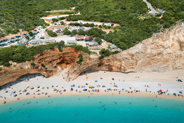 Aerial view of people on the beach in Greece