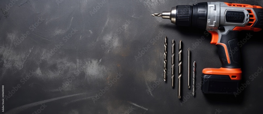 Aufkleber a drill and screwdriver on a black surface created with generative ai technology