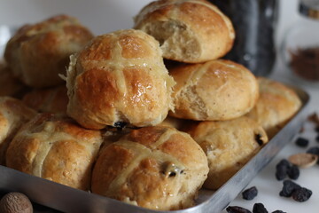 Hot cross buns. A sweet fruit bun lightly spiced with cinnamon and nutmeg and marked with a cross...