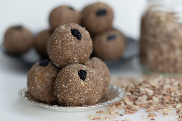 Rajamudi rice flakes laddu. Sweet balls made of roasted rajamudi rice flakes, coconut and jaggery along with cashew and almonds