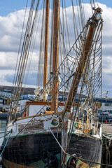 Obraz premium Damaged sailing boat in the harbour of husavik in northern iceland in summer