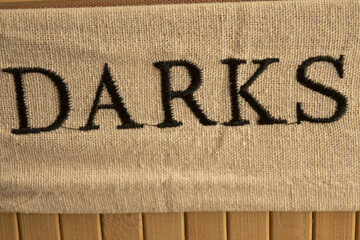 the writing darks on a canvas fabric
