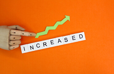 increasing arrows and letters of the alphabet with the word increase. the concept of economic...